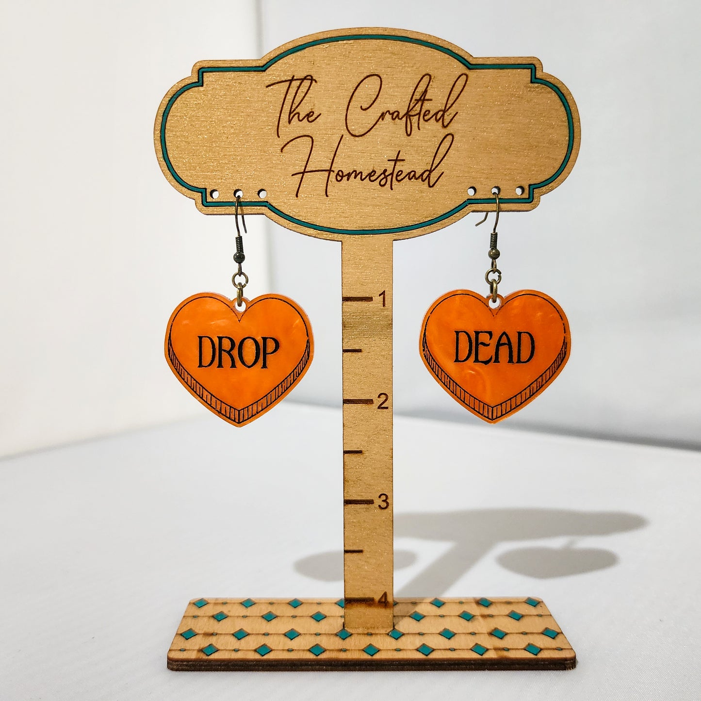 Drop Dead Hearts Dangling Earrings