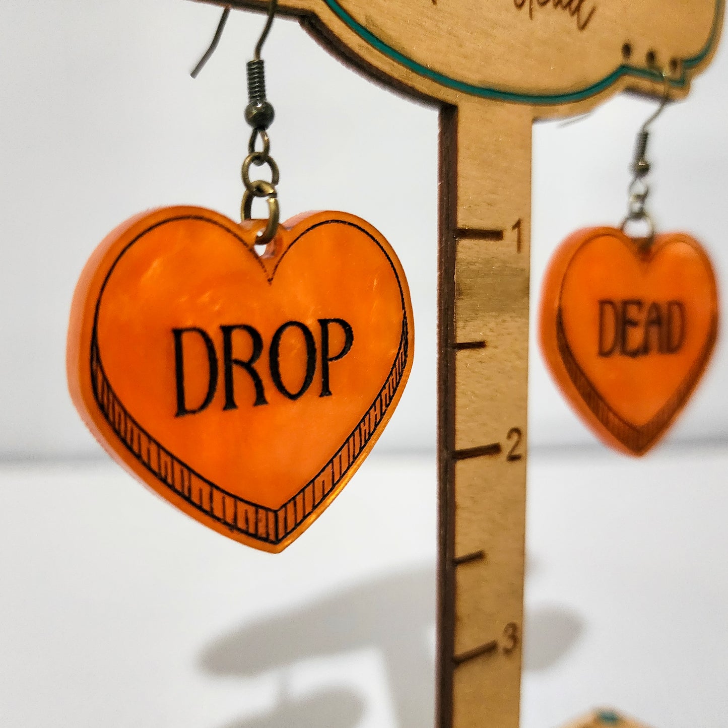 Drop Dead Hearts Dangling Earrings