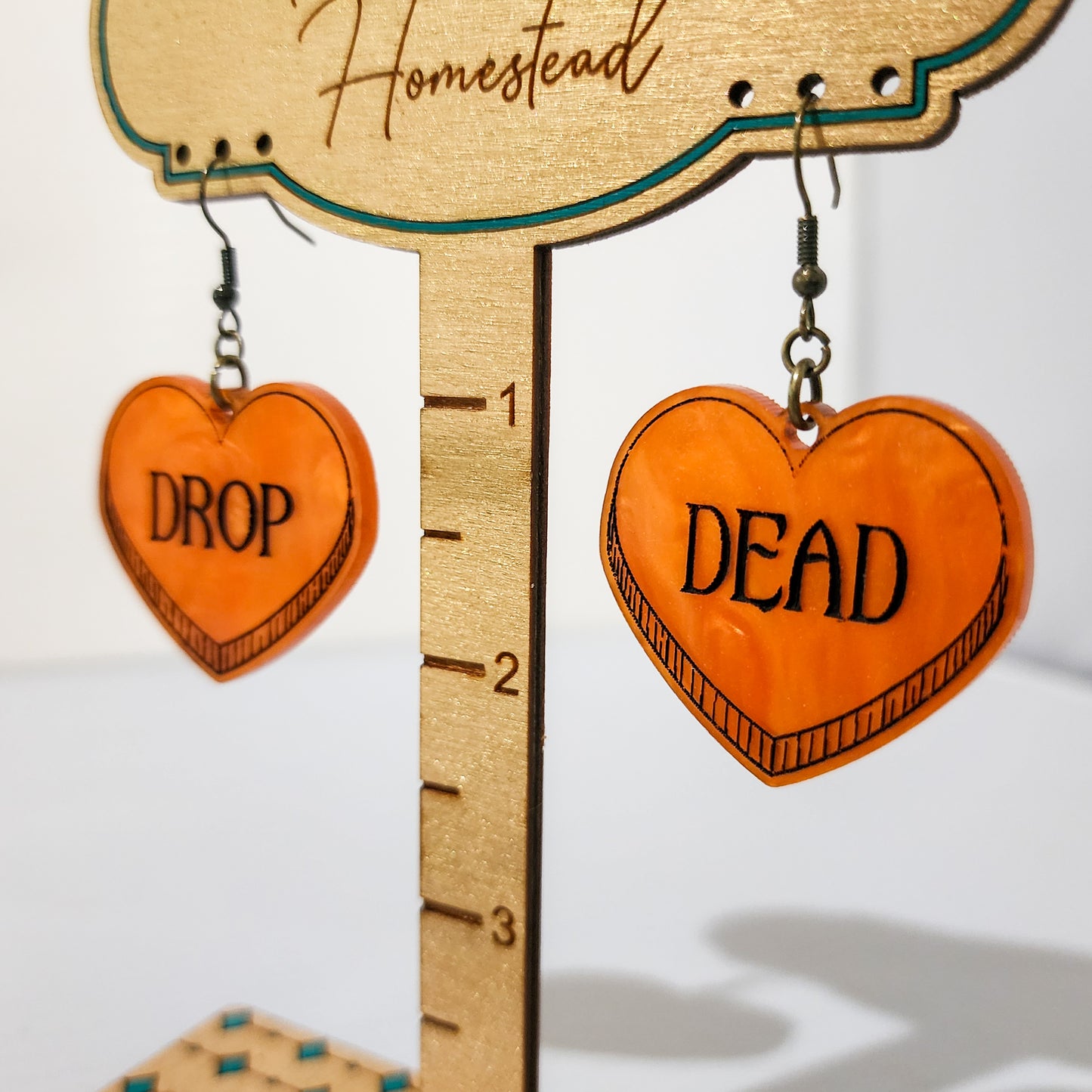 Drop Dead Hearts Dangling Earrings