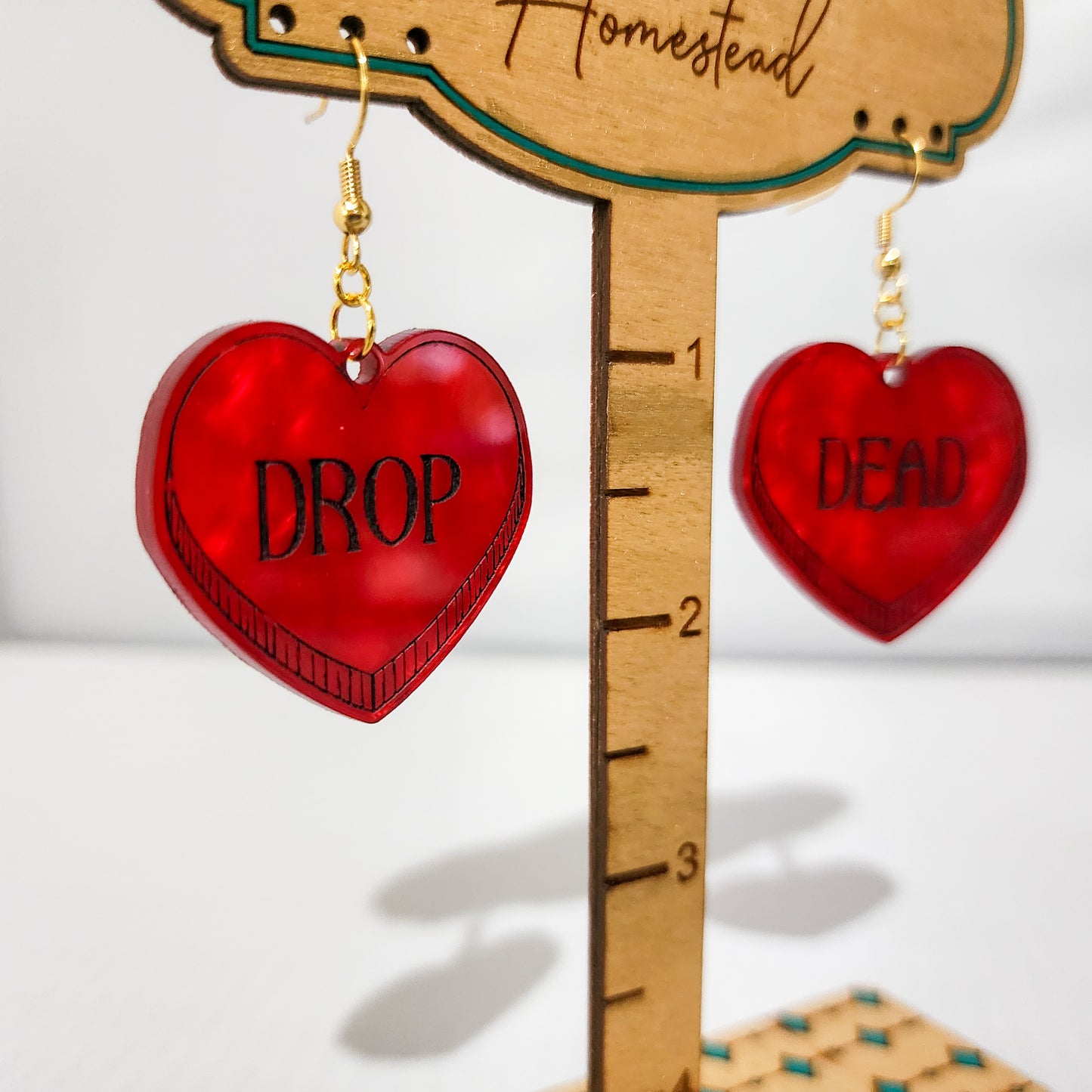 Drop Dead Hearts Dangling Earrings