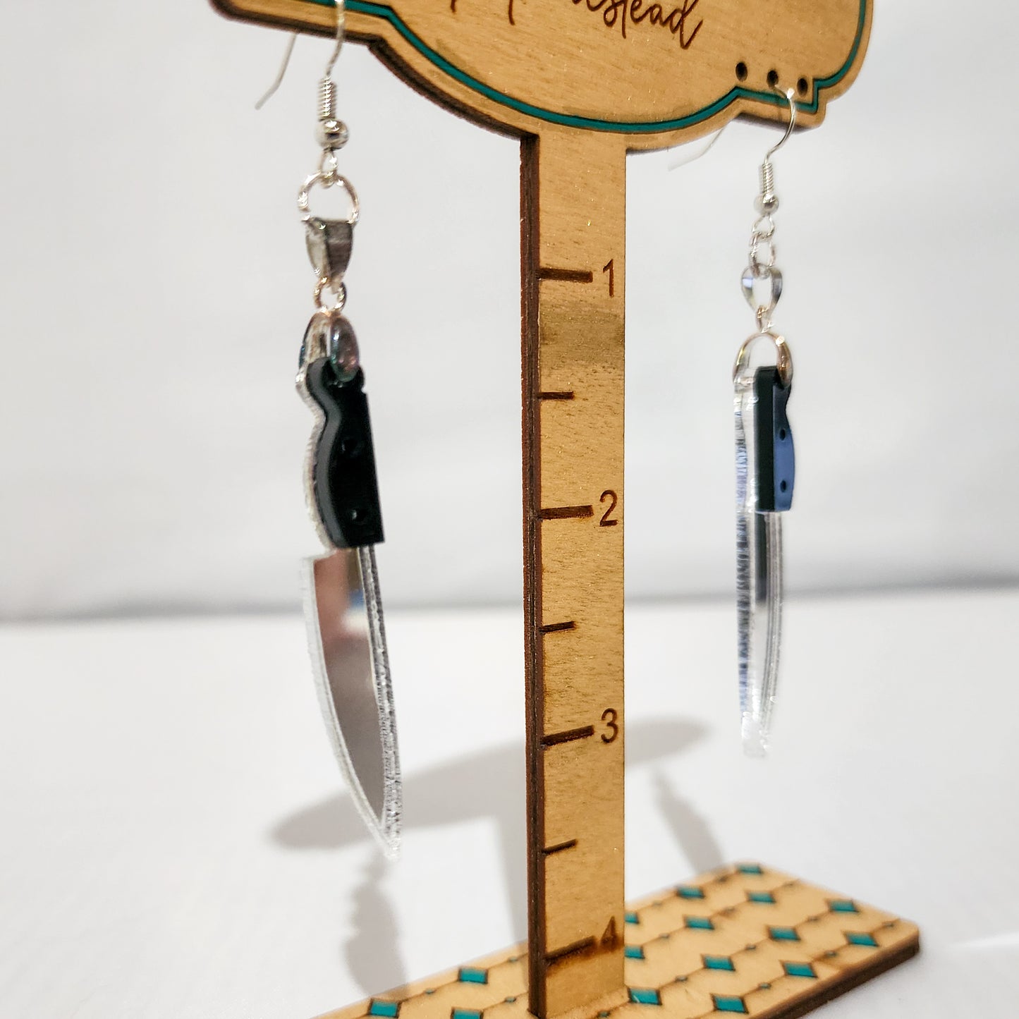 Mirrored Knife Dangling Earrings