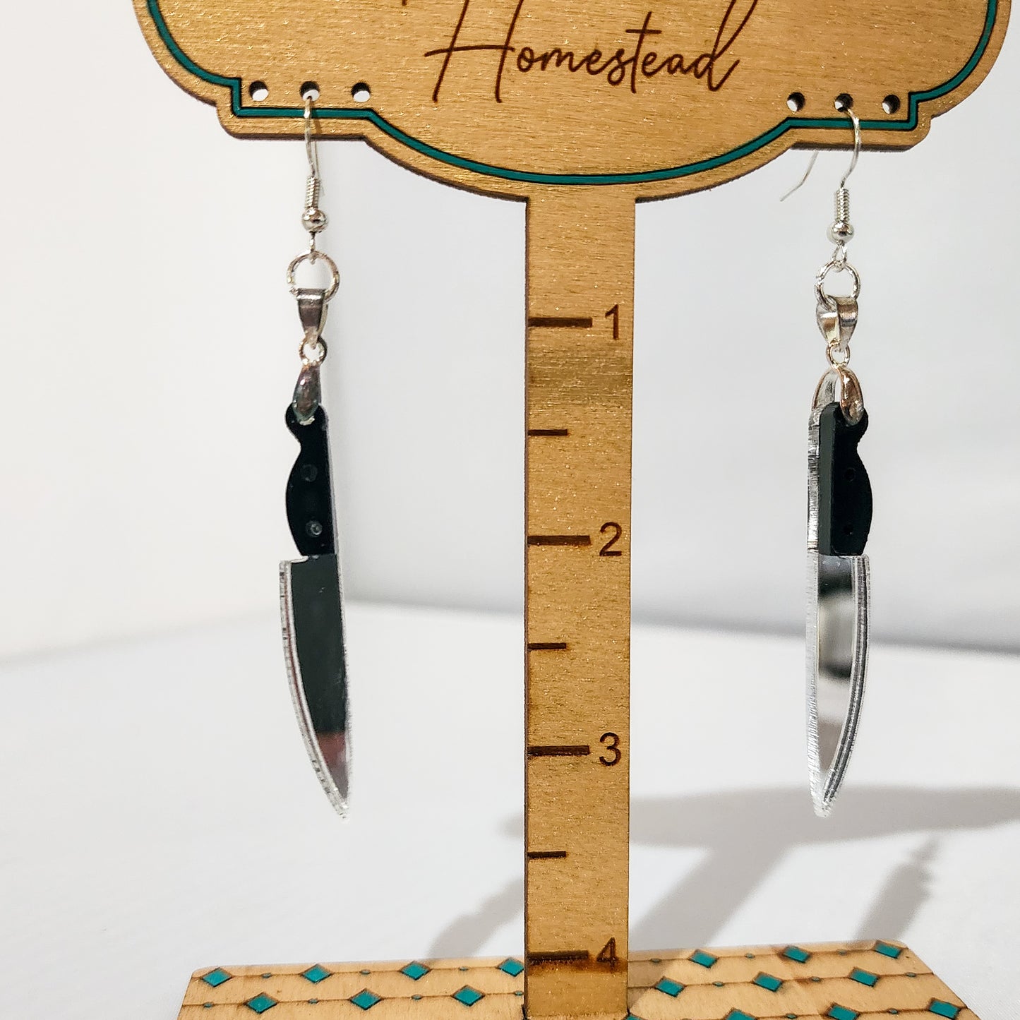 Mirrored Knife Dangling Earrings