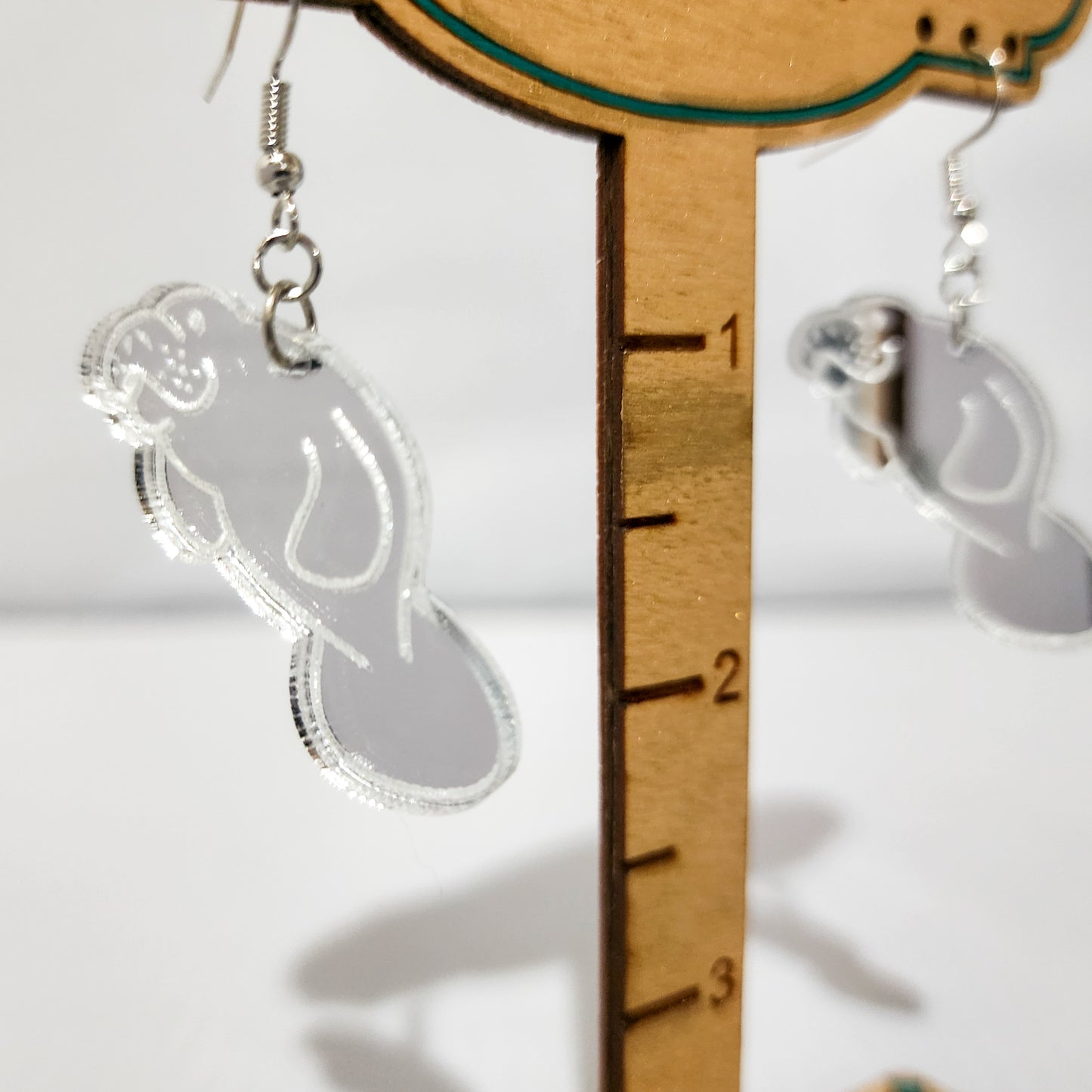 Mirrored Dangling Manatee Earrings