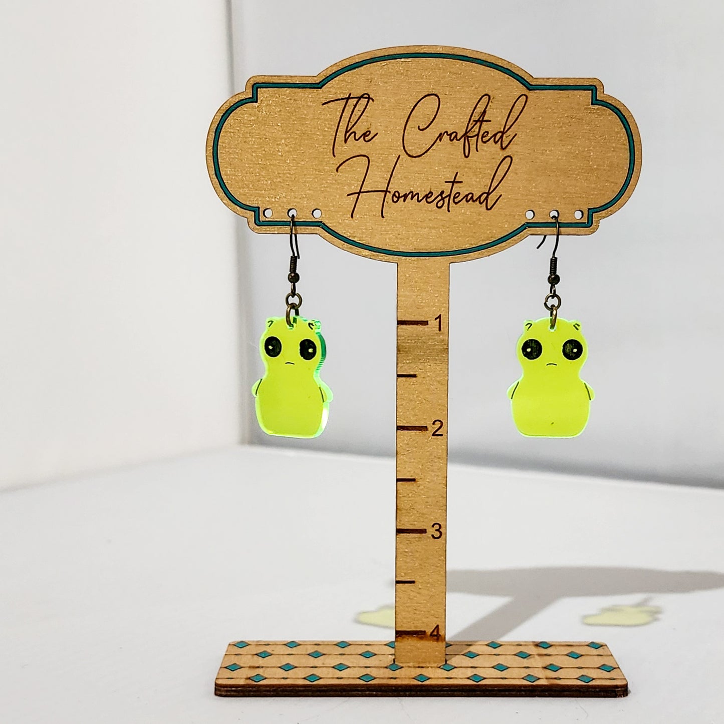 Whimsical Fluorescent Green Creature Earrings