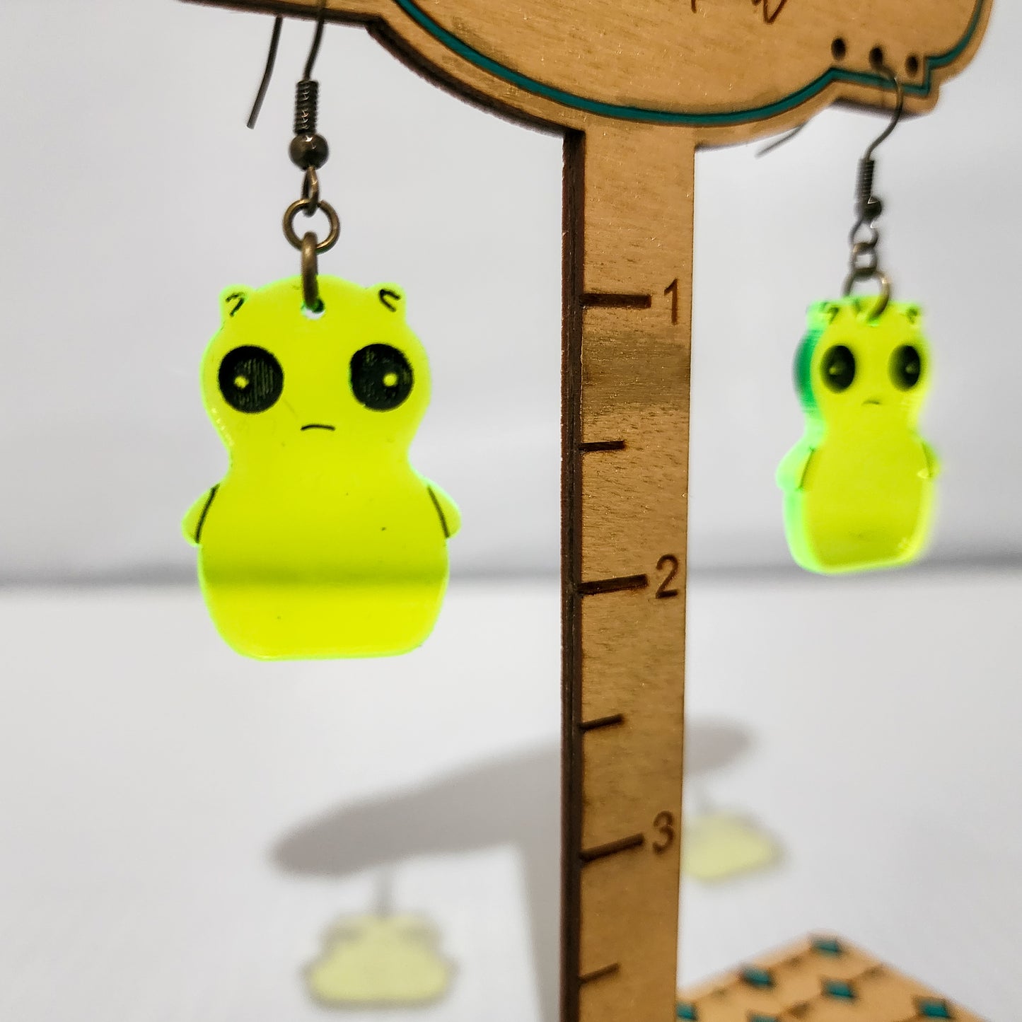 Whimsical Fluorescent Green Creature Earrings