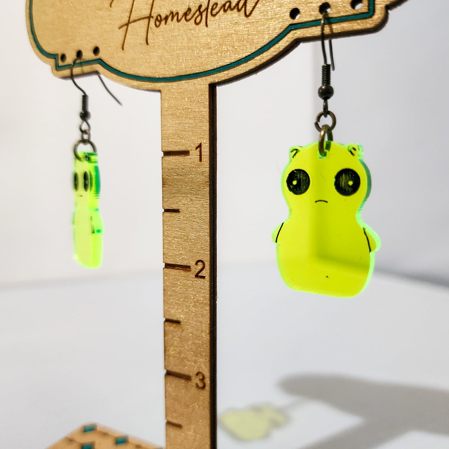 Whimsical Fluorescent Green Creature Earrings