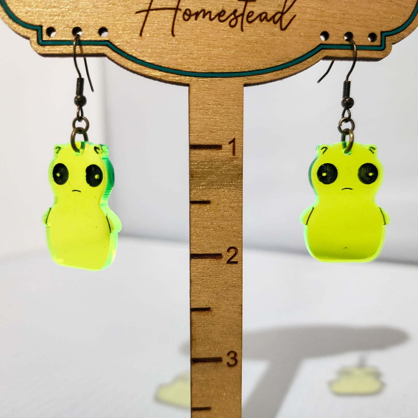 Whimsical Fluorescent Green Creature Earrings